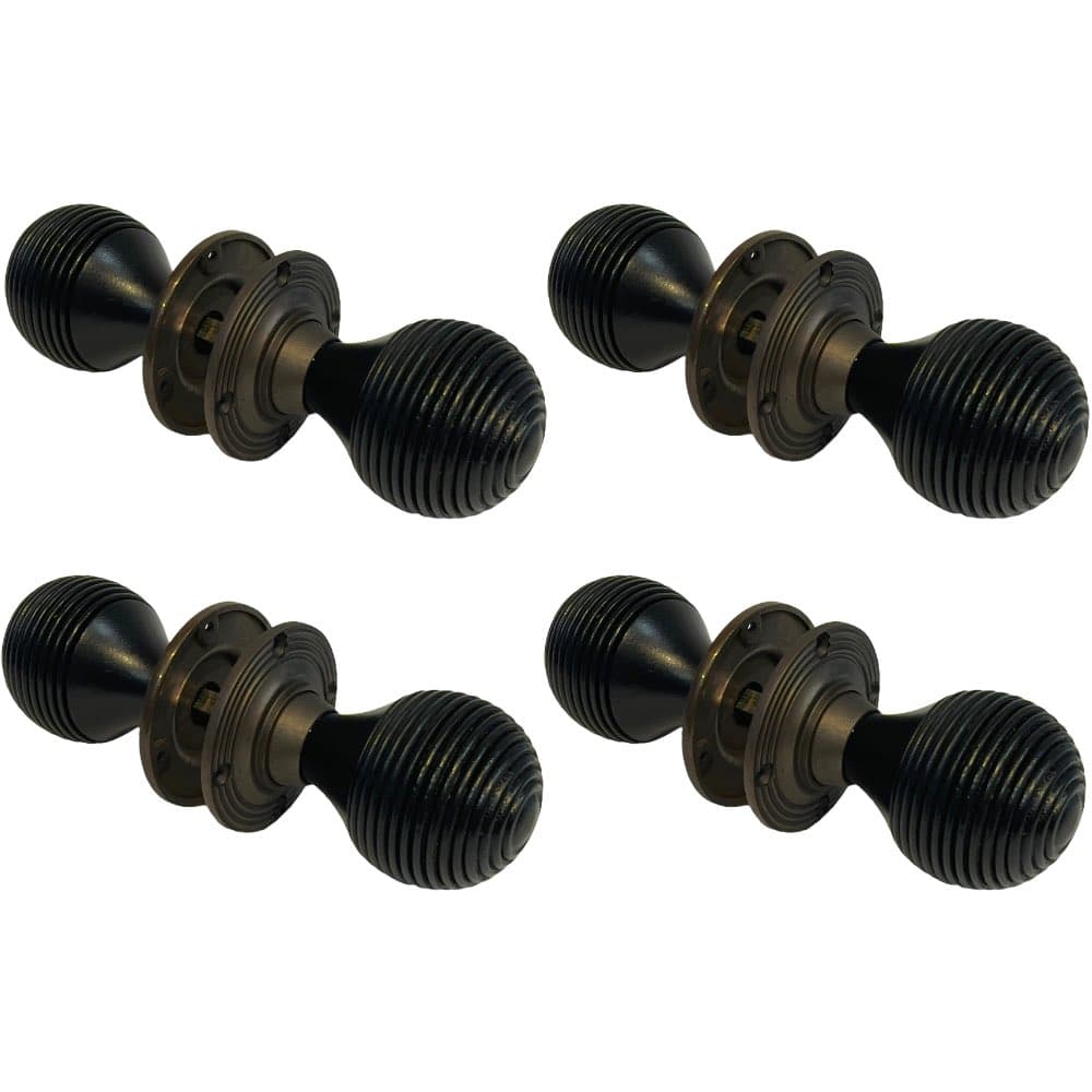 4 pairs of ebonised matt antique wooden beehive door knobs