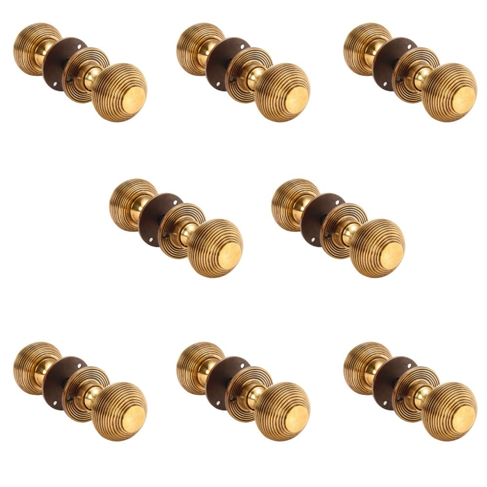 8 Pairs Of Aged Brass Beehive Door Knobs