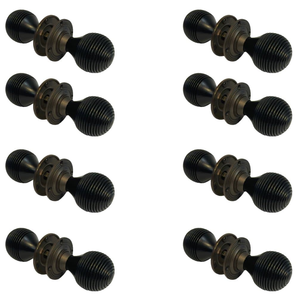 8 pairs of ebonised matt antique beehive wooden door knobs