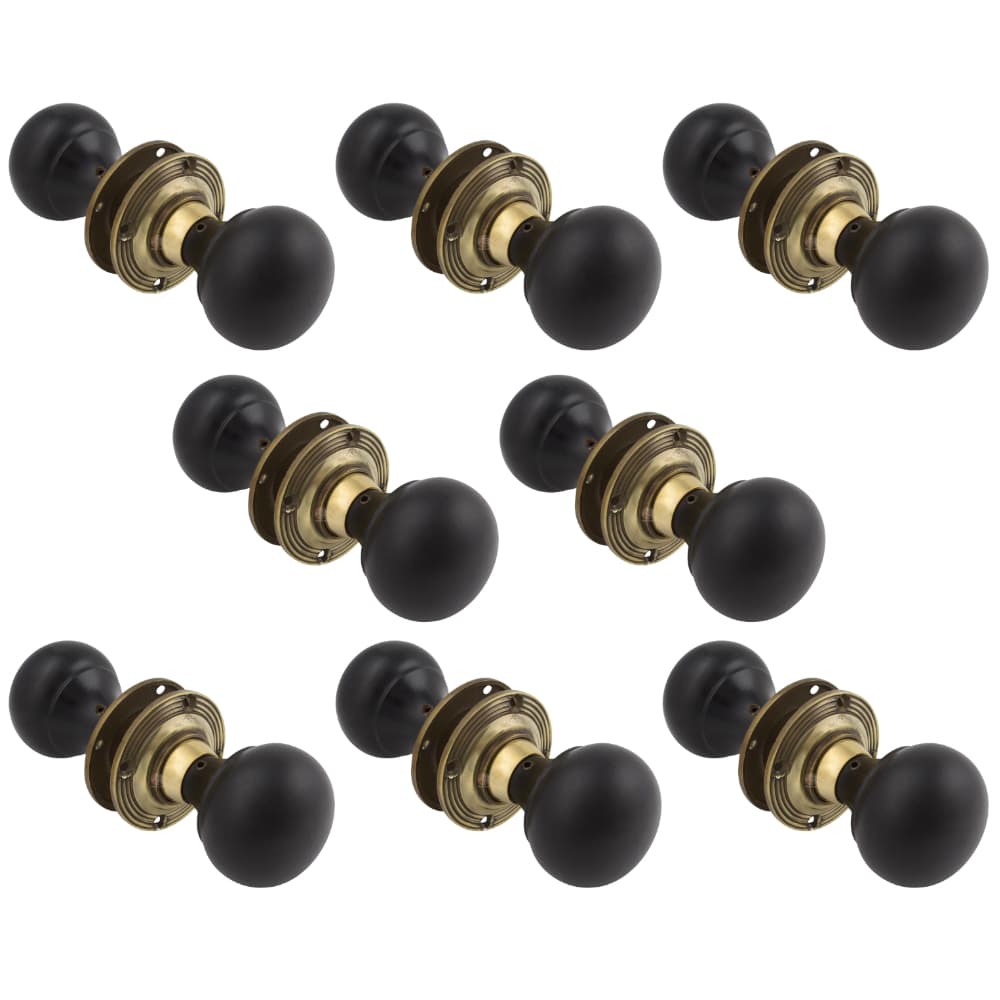 8 Pairs of Ebony & Aged Brass Bun Door Knobs