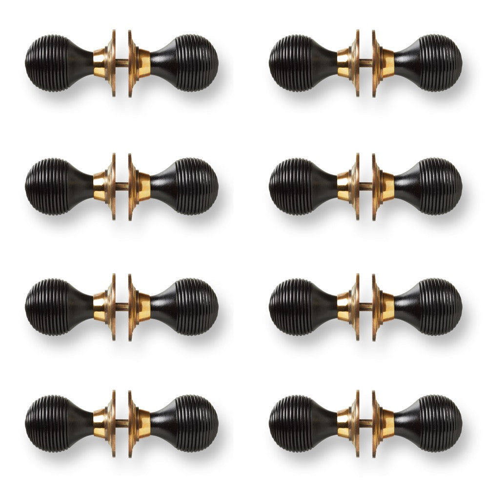 8 Pairs of Ebony Polished Brass Beehive Door Knobs