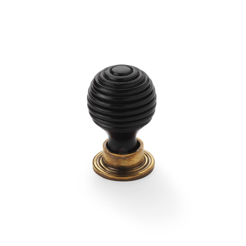 small ebonised aged brass beehive cupboard door knob