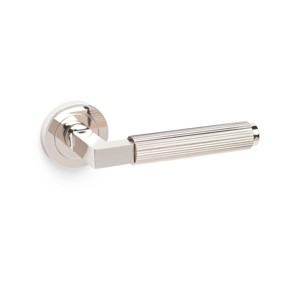 Polished Nickel Reeded Lever On Round Rose Pair