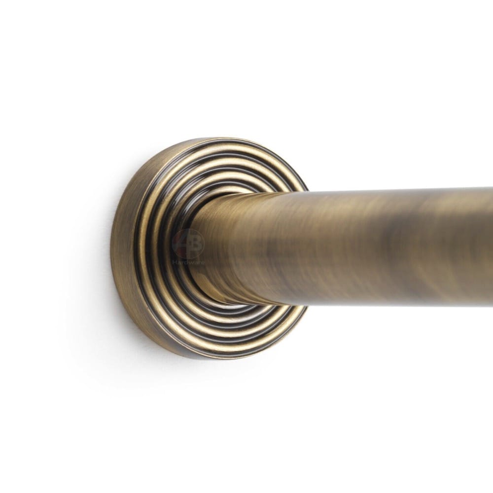 Solid Brass Cylinder Door Stop On Reeded Backplate - Antique Brass