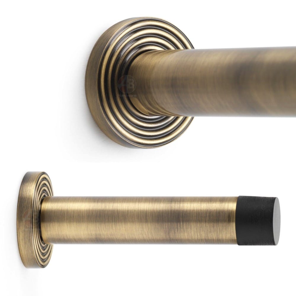 Solid Brass Cylinder Door Stop On Reeded Backplate - Antique Brass