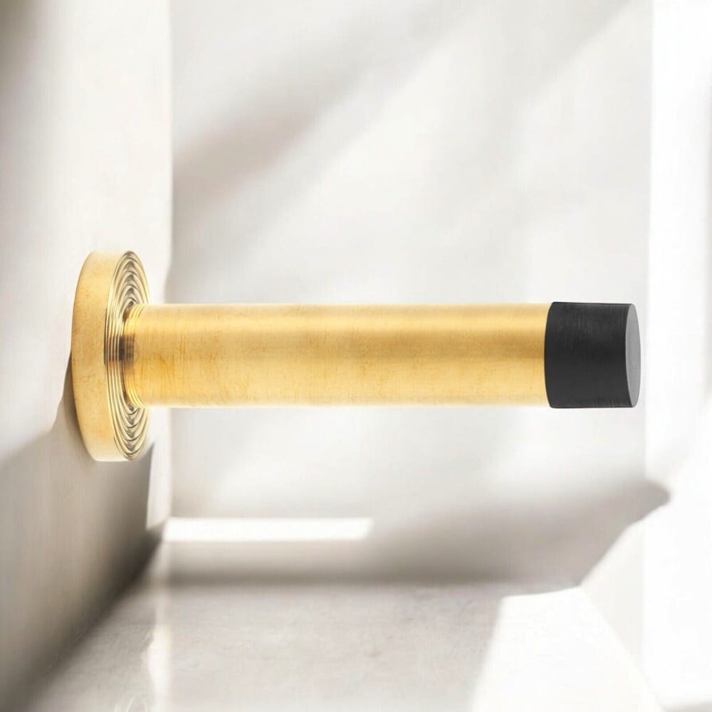 Solid Brass Cylinder Door Stop On Reeded Backplate - Polished Brass